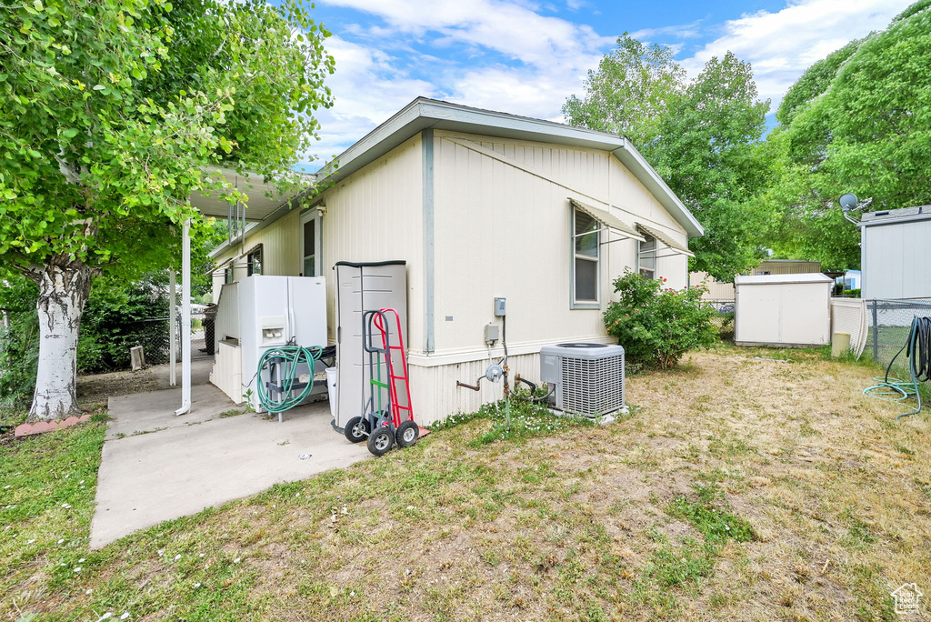 Back of property featuring a shed