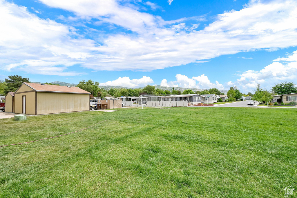View of yard featuring a mountain view and a residential view