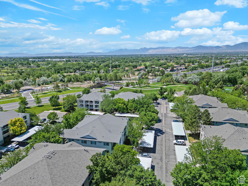 Aerial view of residential area with a mountainous background