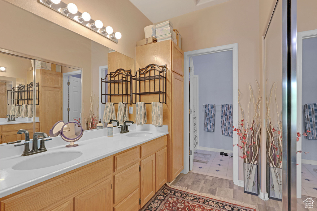 Bathroom featuring double vanity