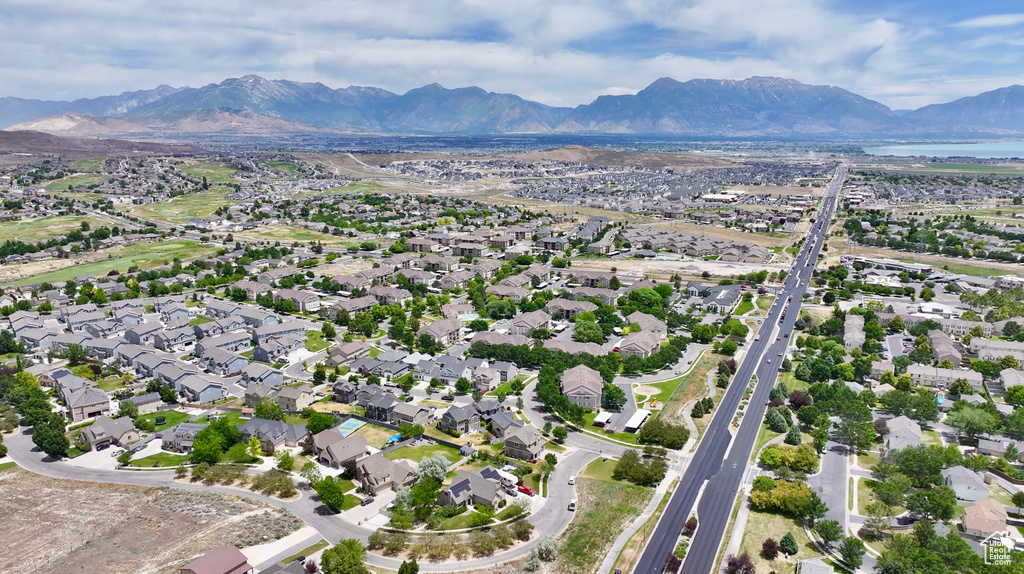 Aerial view of residential area with a mountain backdrop