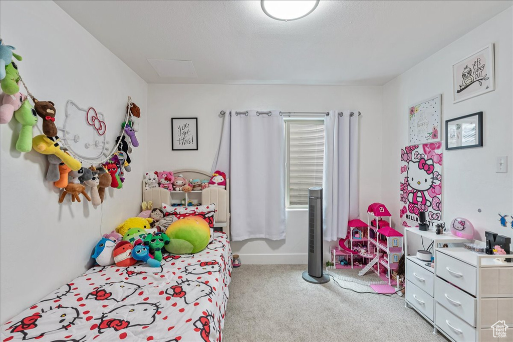 Bedroom with light carpet