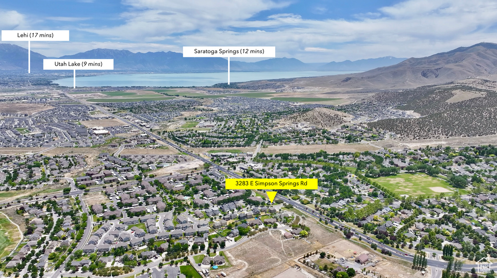 View of property location featuring a water and mountain view