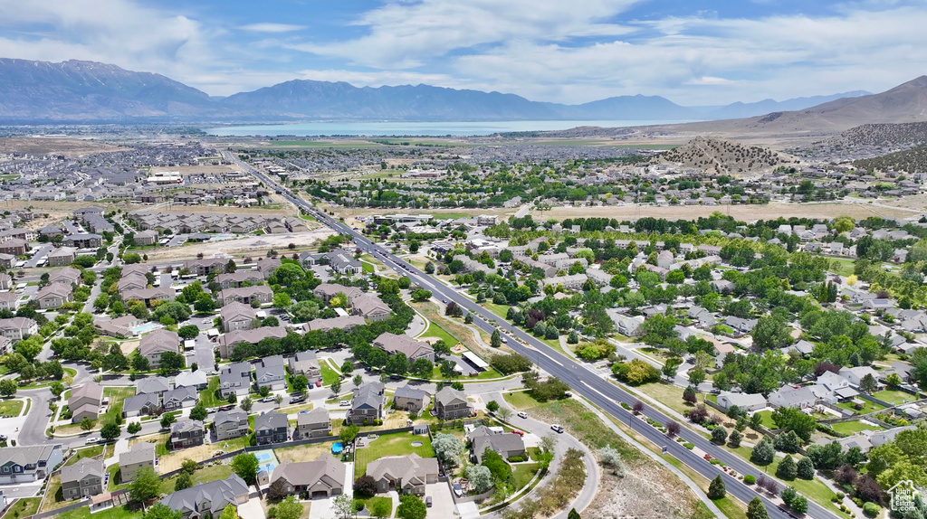 Aerial overview of property\'s location featuring a mountain backdrop