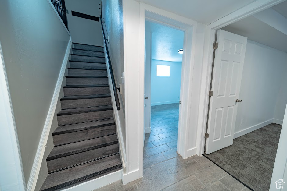 Stairs featuring baseboards