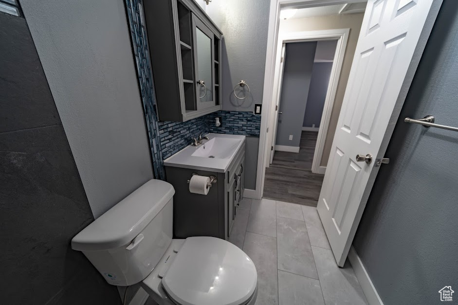 Bathroom with vanity and toilet