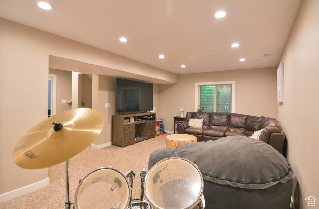 Living area featuring recessed lighting and carpet floors