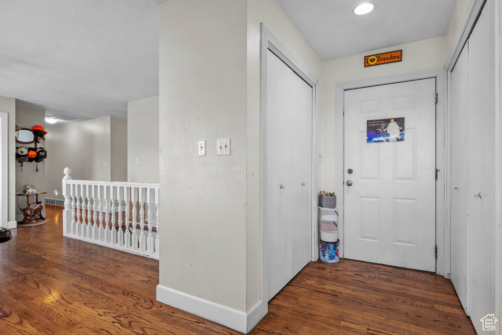 Foyer with wood finished floors