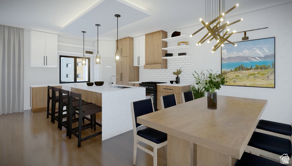 Kitchen featuring open shelves, light wood finished floors, modern cabinets, decorative backsplash, and light countertops