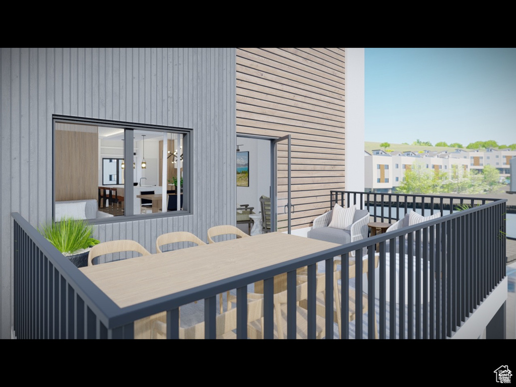Wooden terrace featuring outdoor dining area