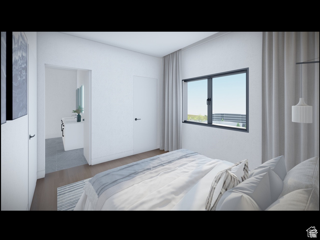 Bedroom with wood finished floors