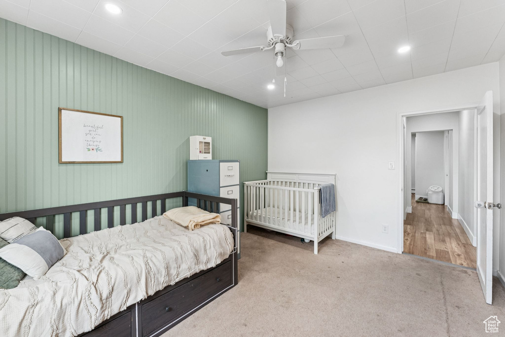 Bedroom featuring carpet flooring, ceiling fan, and recessed lighting