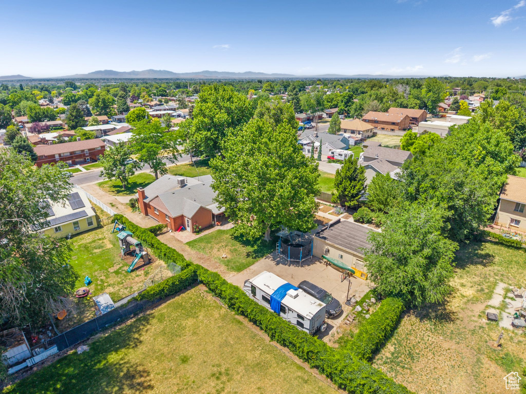 Aerial view of residential area with a mountain backdrop