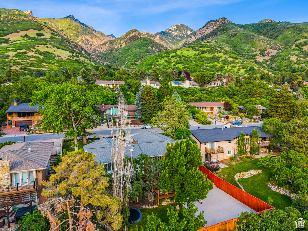 Aerial view of residential area featuring a mountain backdrop