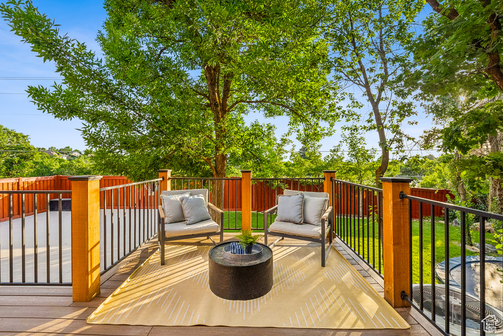 Deck featuring outdoor lounge area