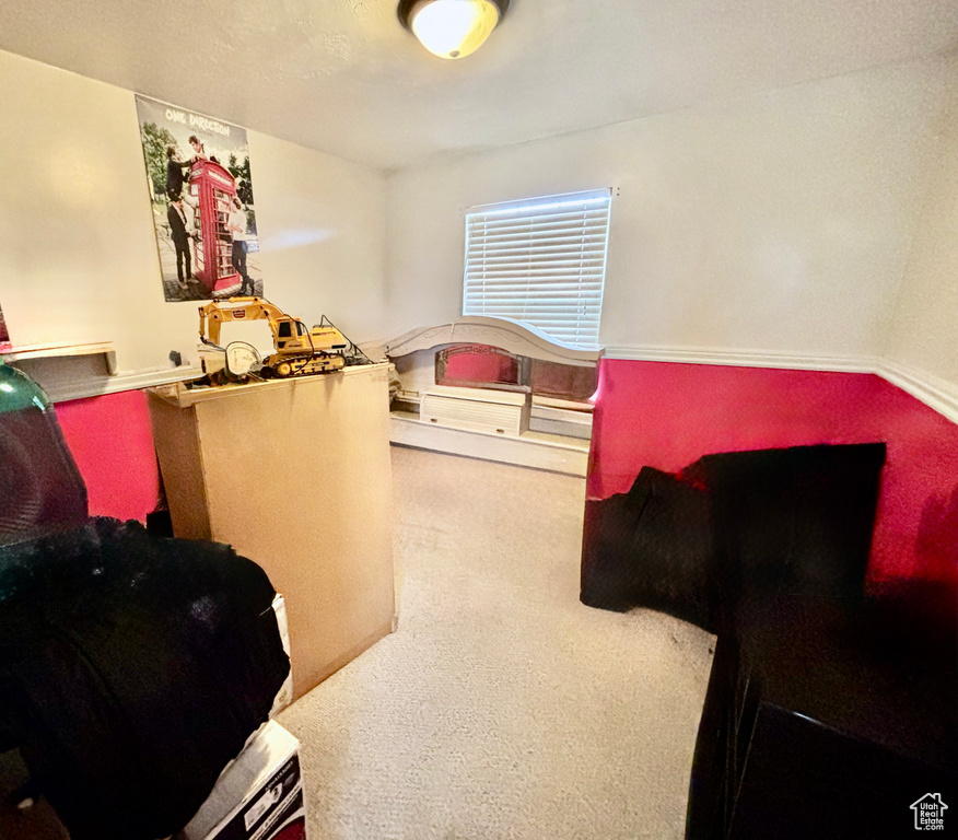 Bedroom featuring carpet flooring