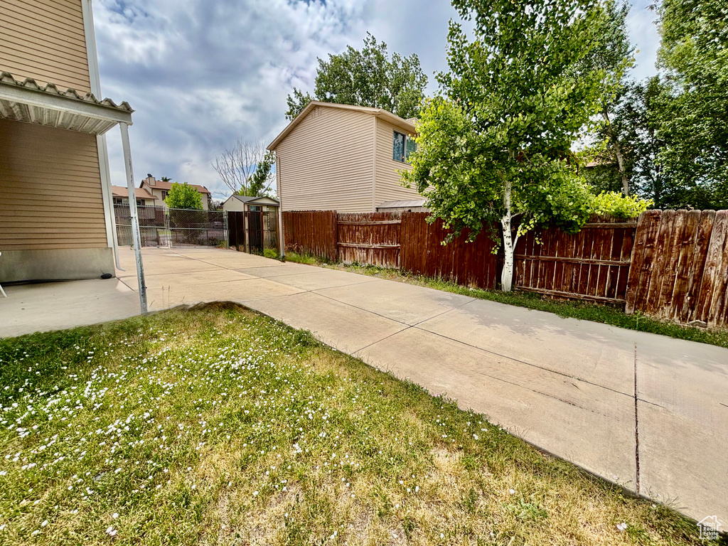 Fenced yard featuring a patio area