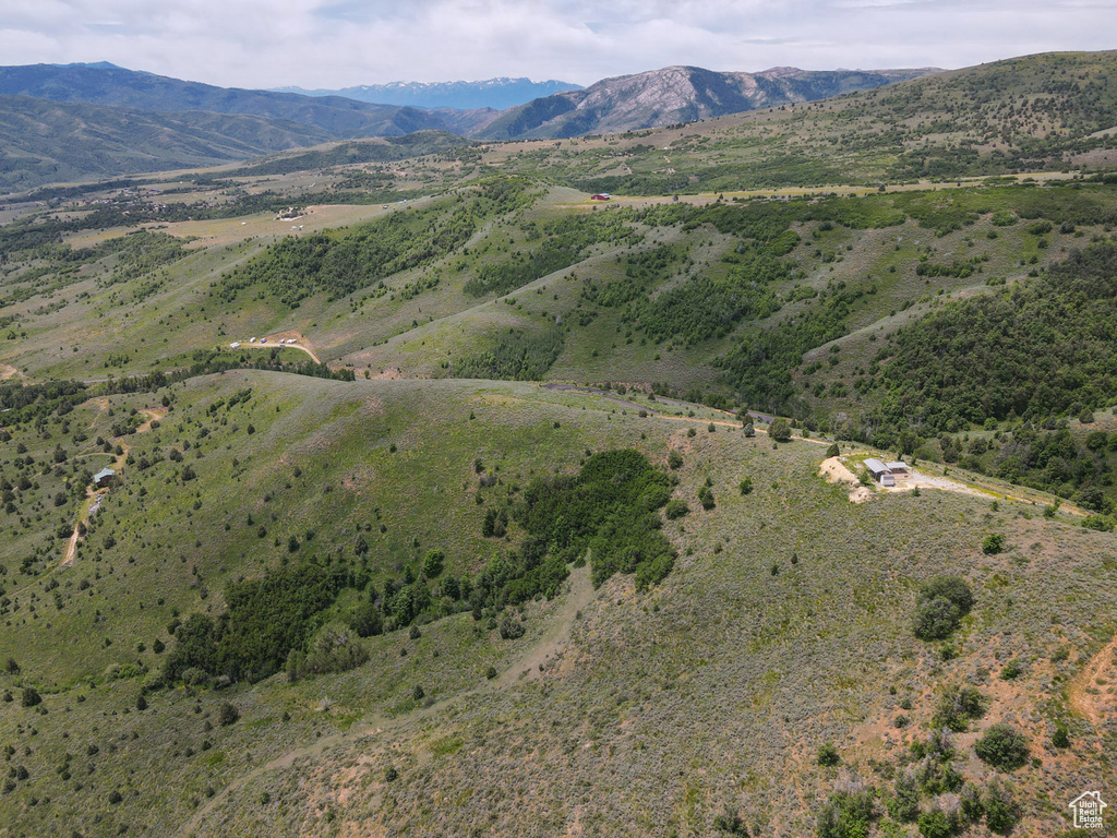 Aerial view of property\'s location with mountains