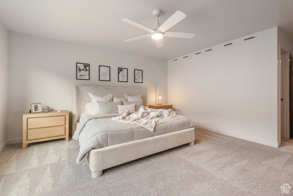Bedroom featuring carpet floors and ceiling fan