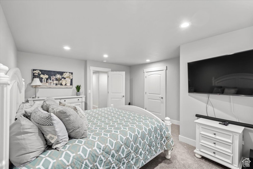 Bedroom with carpet floors and recessed lighting