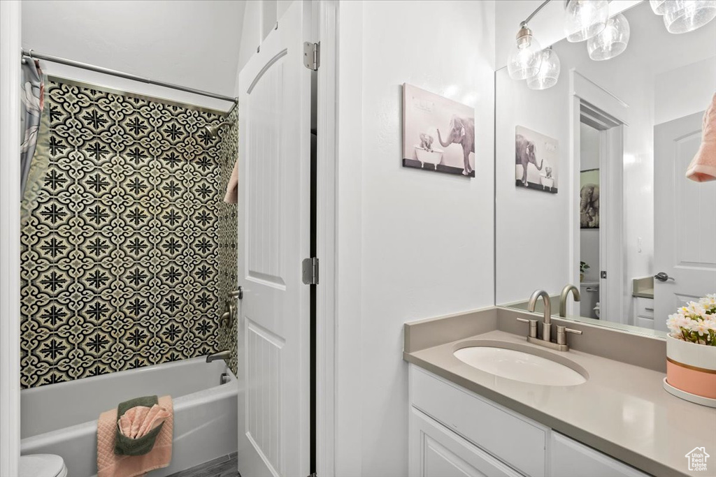 Full bathroom with vanity and shower / bath combination