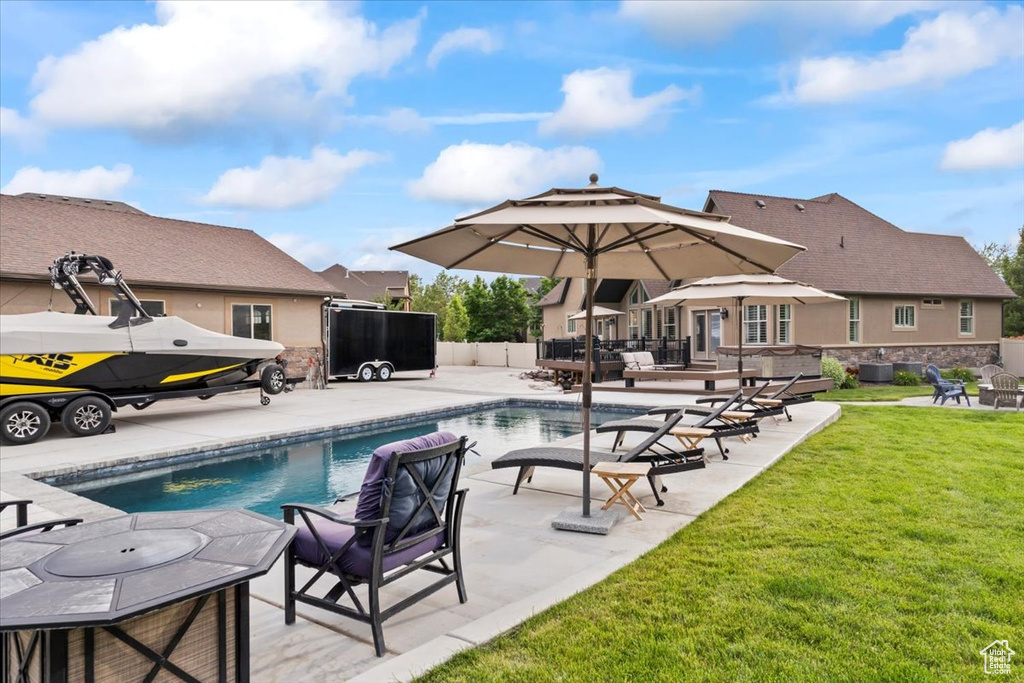 View of pool with a patio