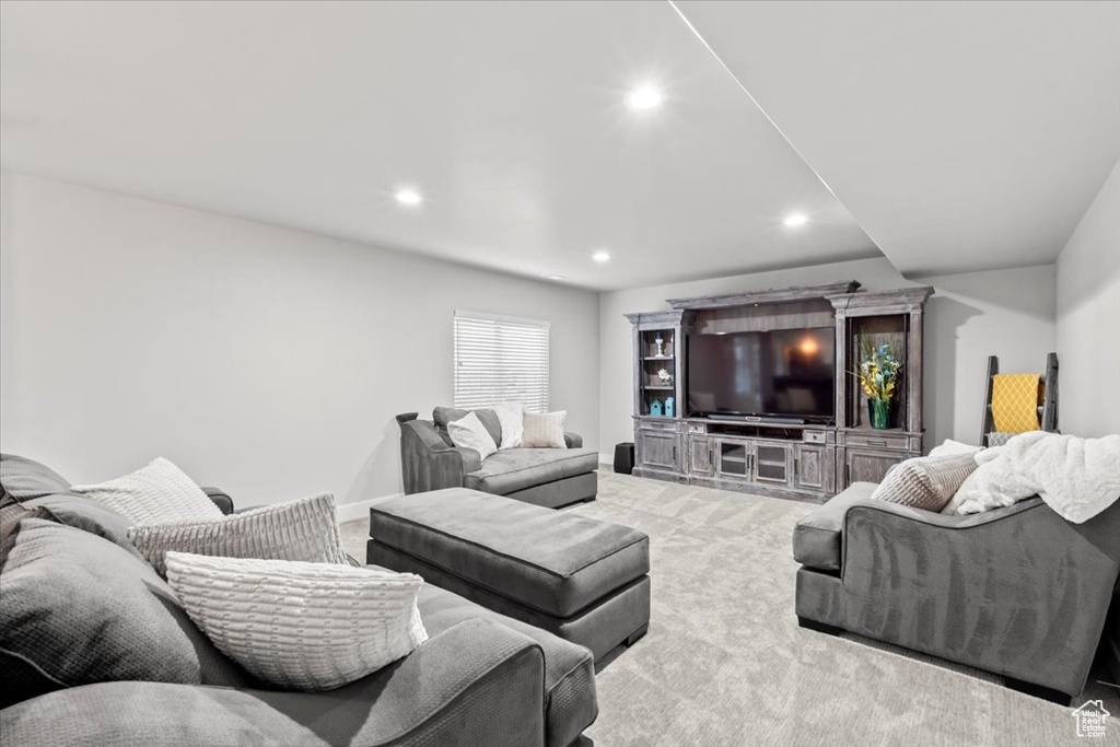 Living room with carpet and recessed lighting