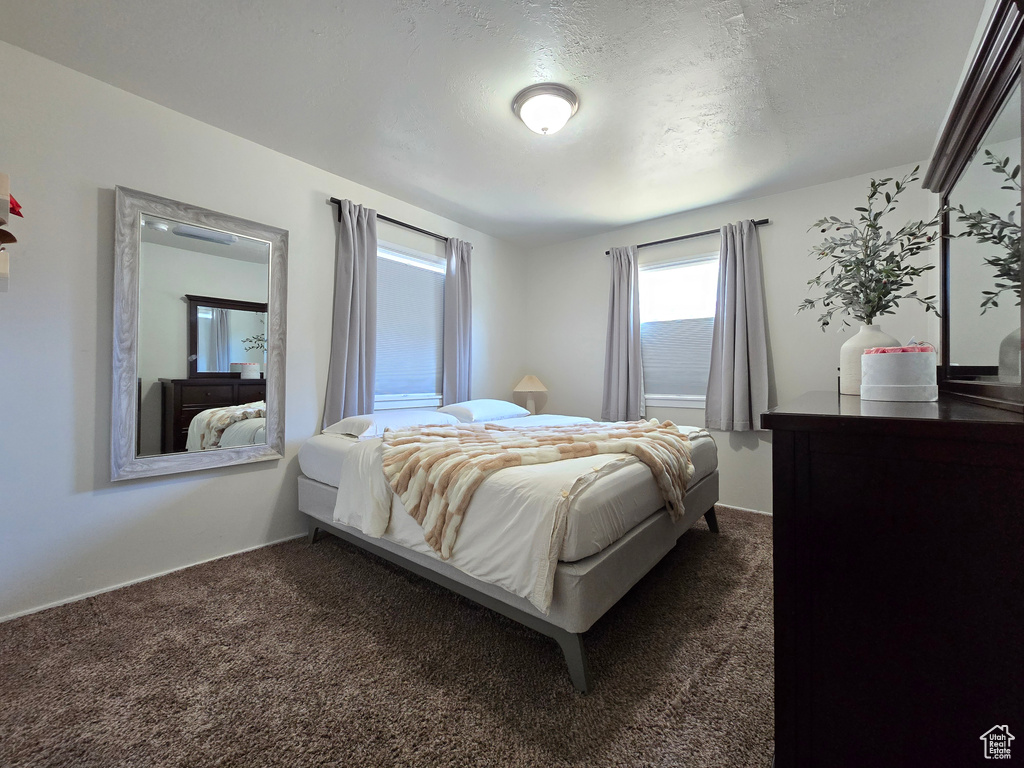 Bedroom featuring carpet