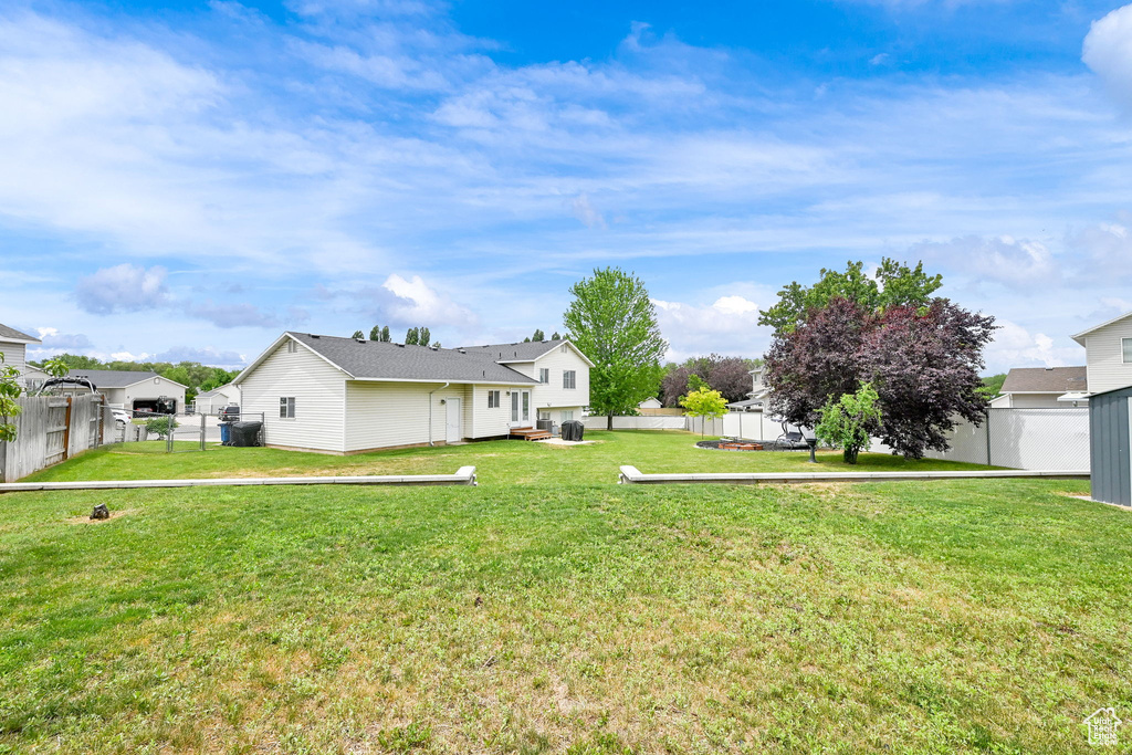 View of fenced backyard