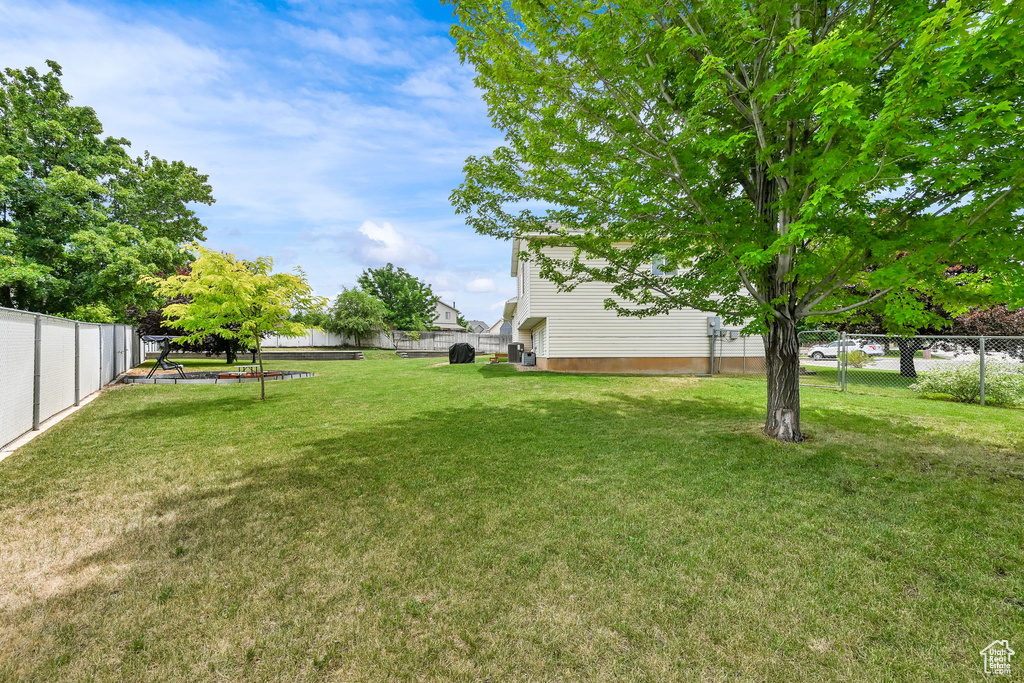 View of fenced backyard