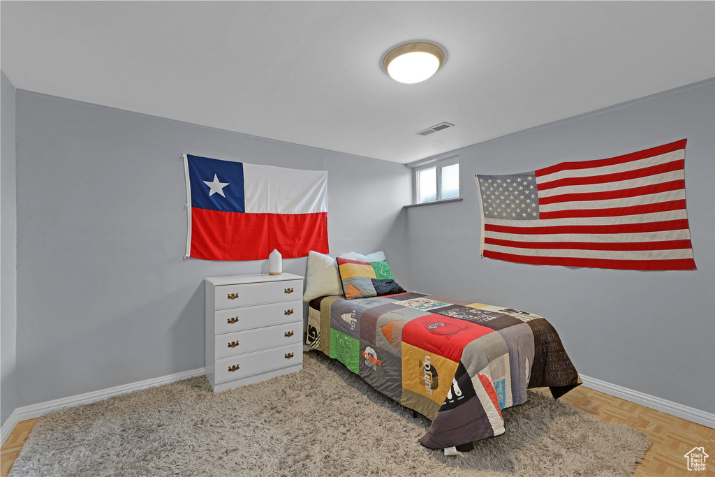 Bedroom featuring baseboards