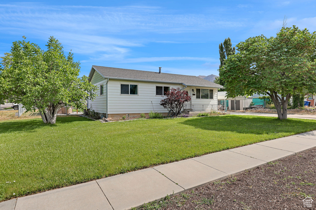 View of front of home with a front yard