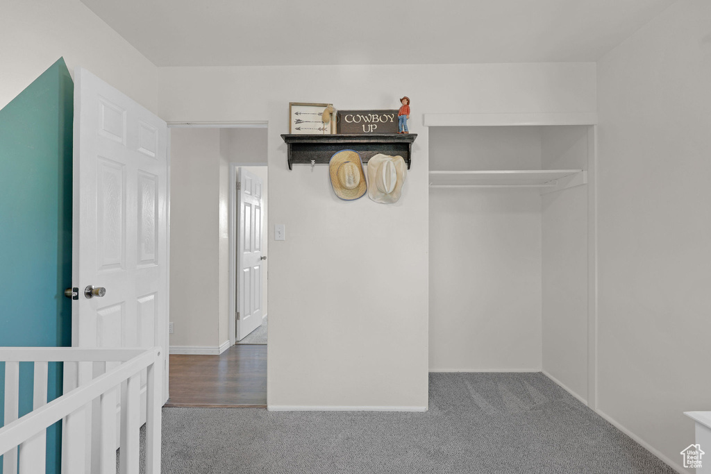 Unfurnished bedroom featuring carpet flooring
