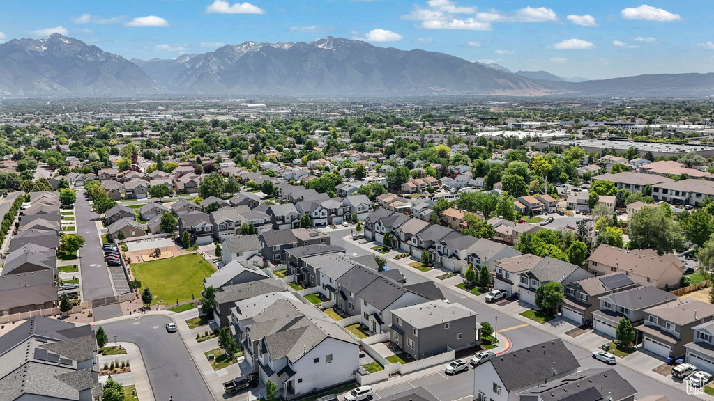 Aerial view of residential area featuring mountains