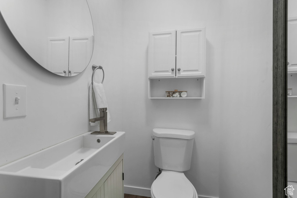 Bathroom featuring toilet and vanity