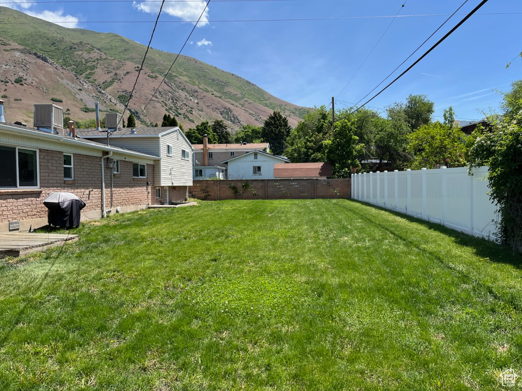 View of yard featuring a mountain view
