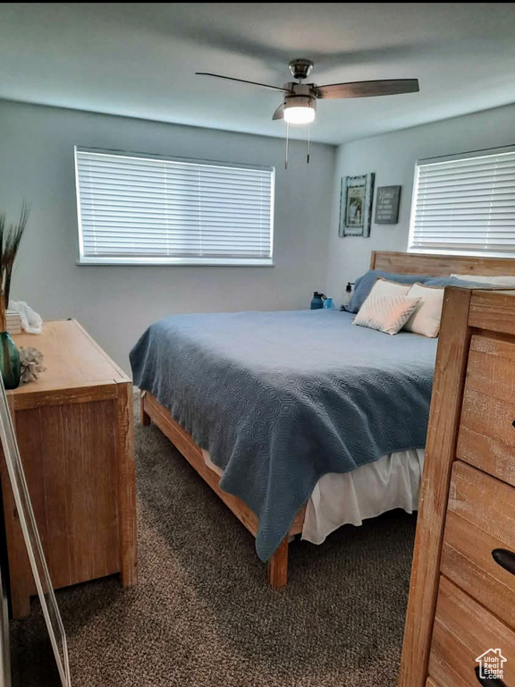 Bedroom featuring carpet floors and ceiling fan