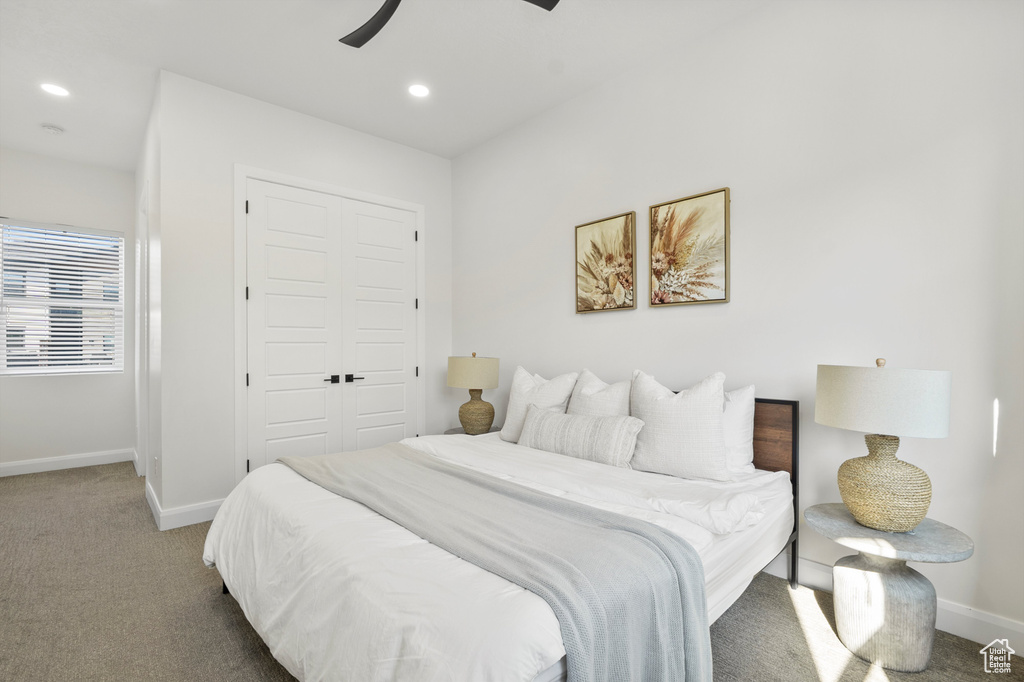 Bedroom with carpet flooring, a closet, recessed lighting, and ceiling fan