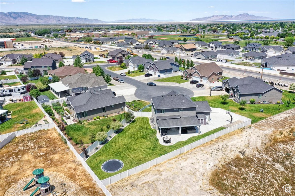 Aerial view of residential area with a mountain backdrop