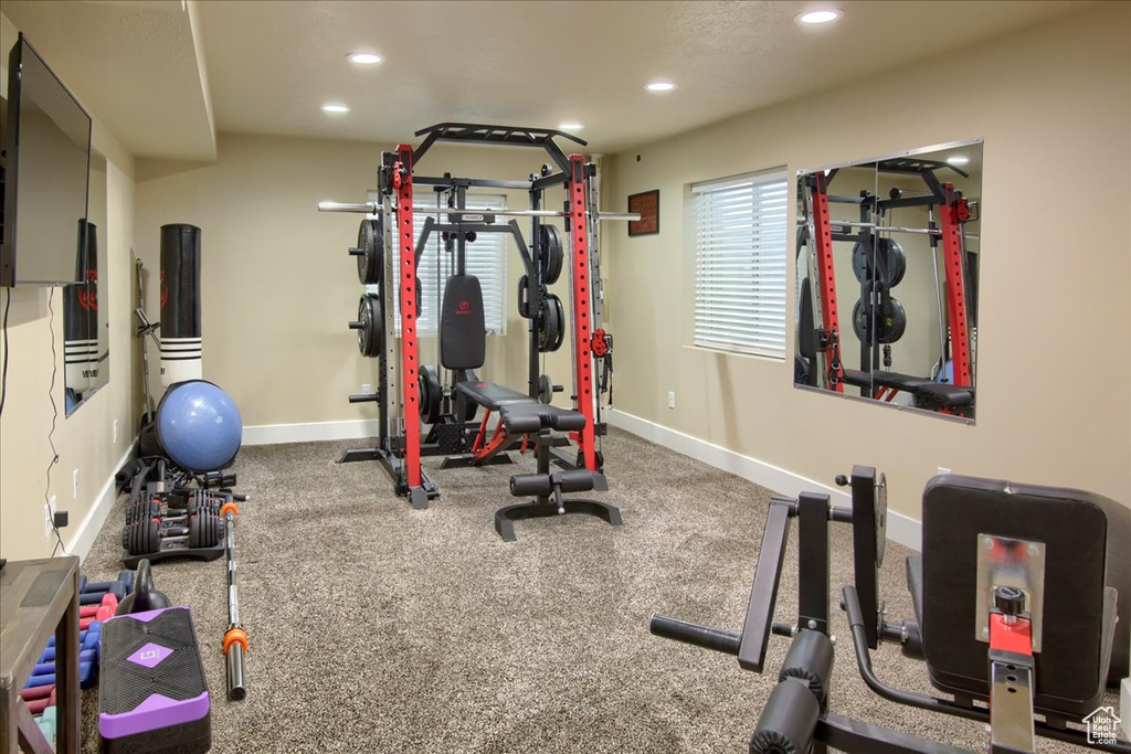 Exercise room featuring recessed lighting