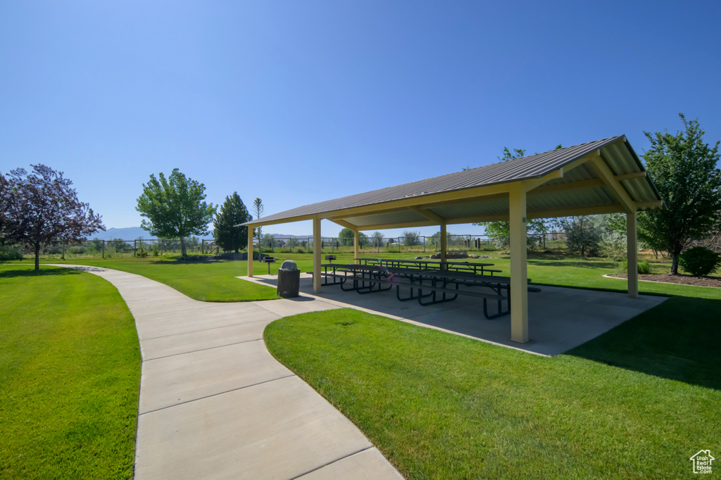 View of home's community with a gazebo and a lawn