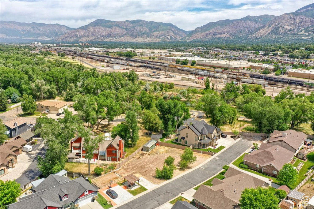 Aerial view of residential area with a mountain backdrop