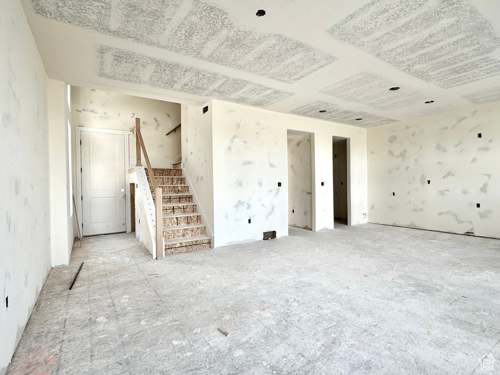 Empty room featuring stairs