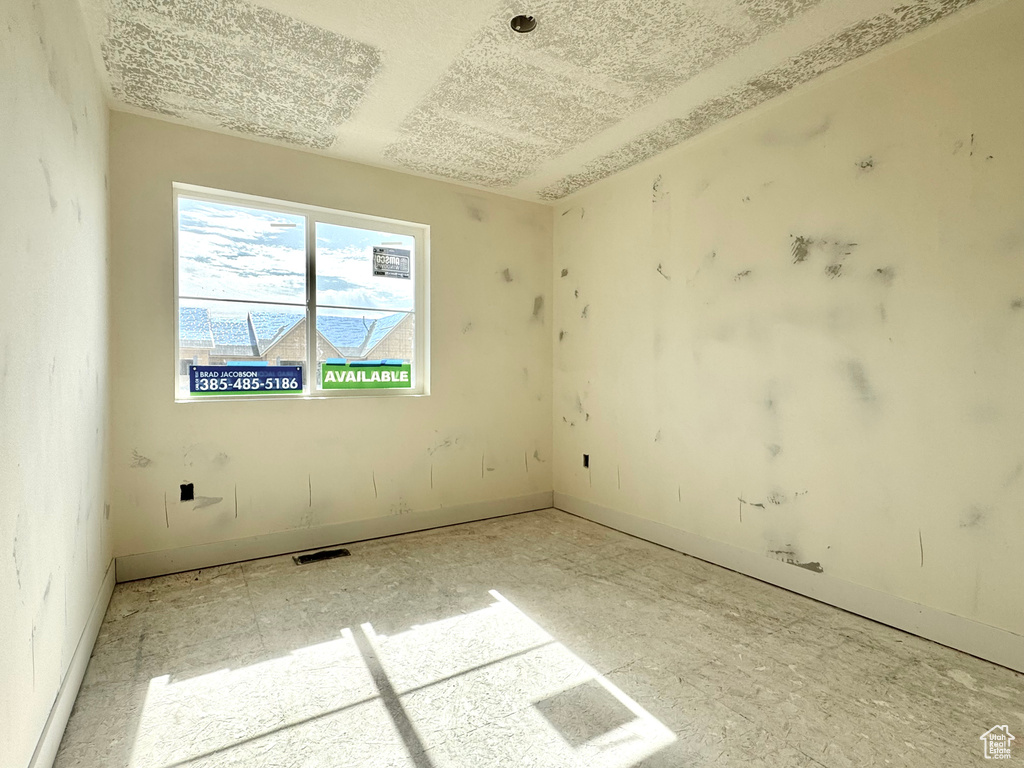 Empty room with baseboards