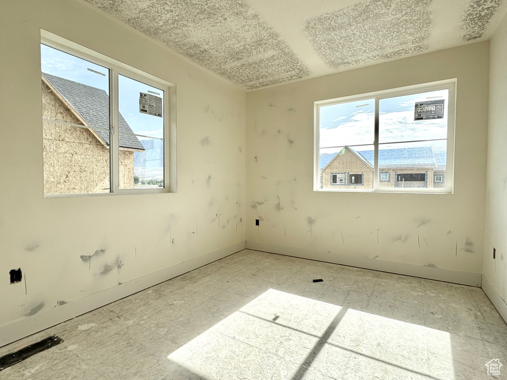 Empty room with baseboards