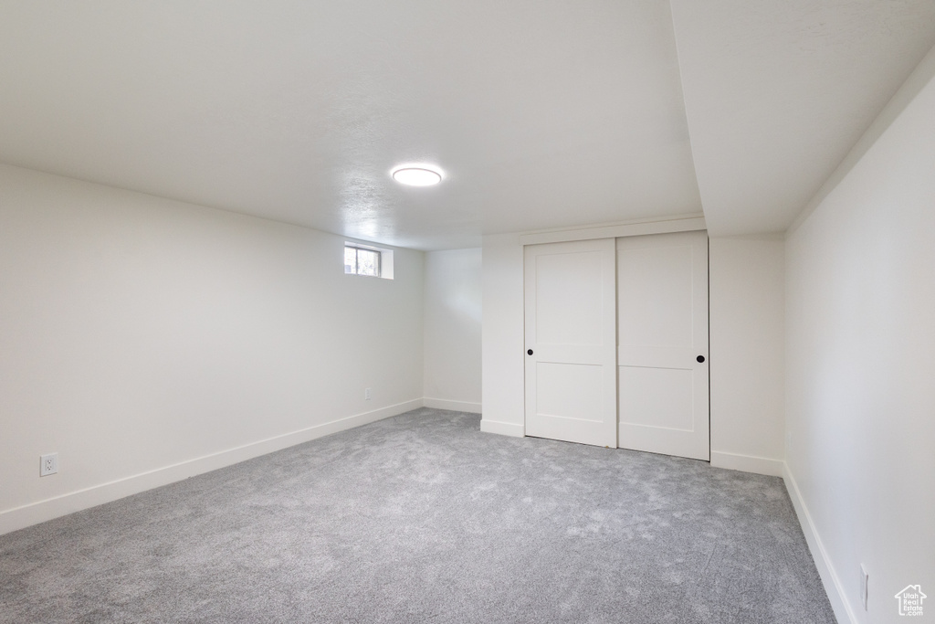 Below grade area featuring carpet