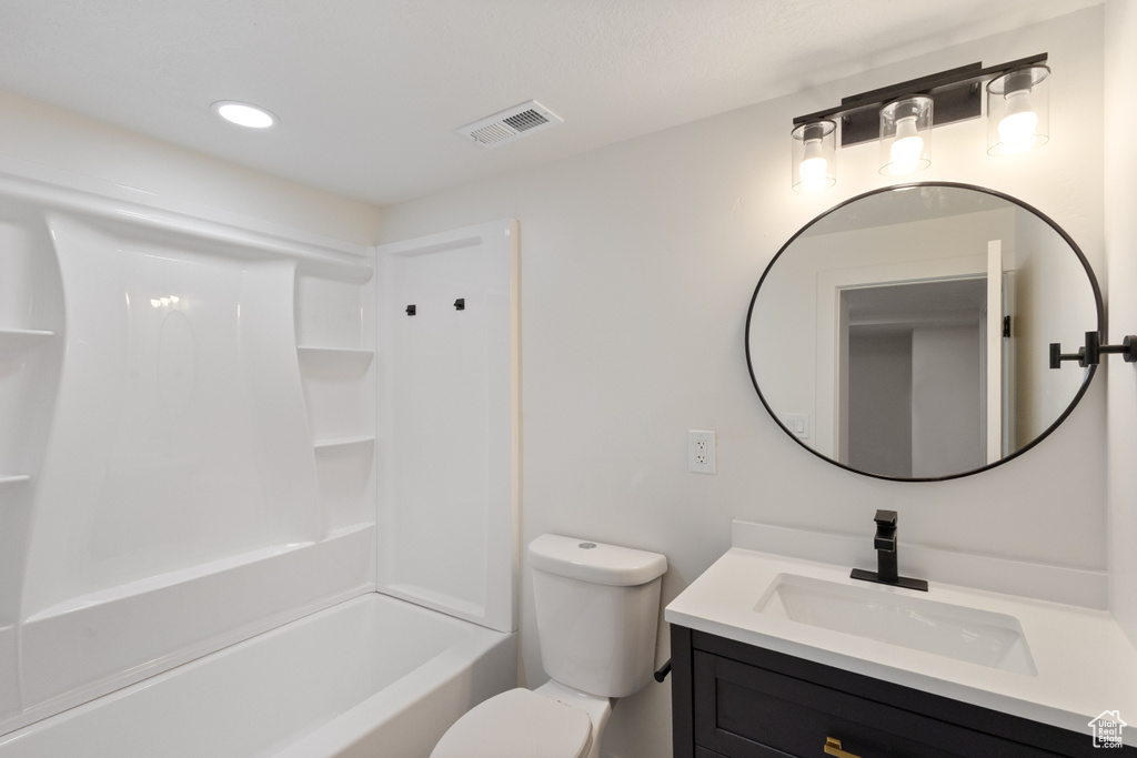 Full bath with vanity, bathing tub / shower combination, and recessed lighting