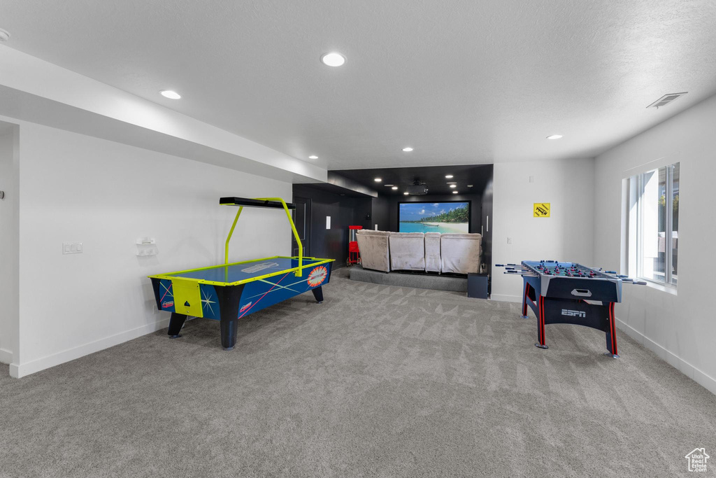 Game room featuring carpet floors and recessed lighting