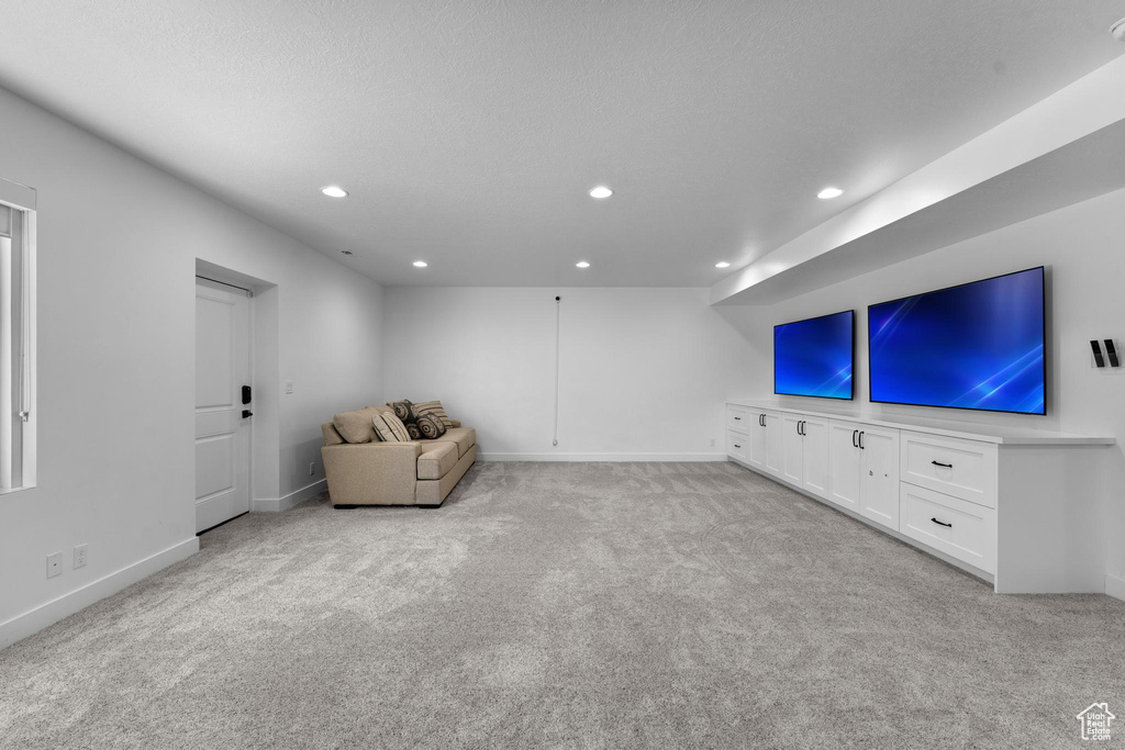 Unfurnished room featuring carpet floors and recessed lighting