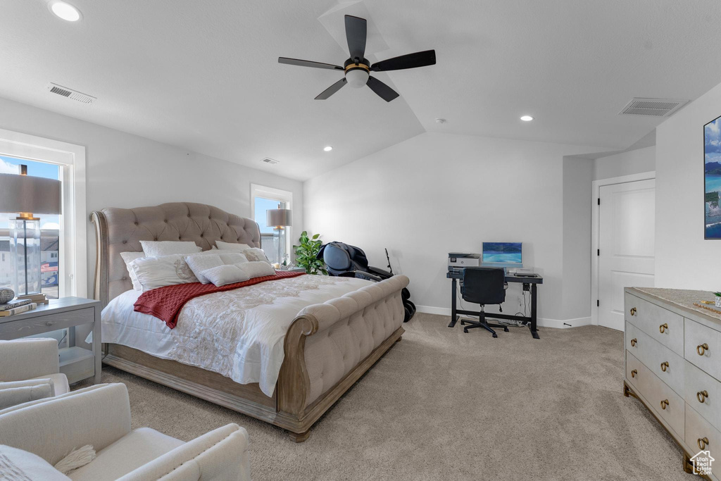 Bedroom featuring light colored carpet, recessed lighting, lofted ceiling, a desk, and a ceiling fan